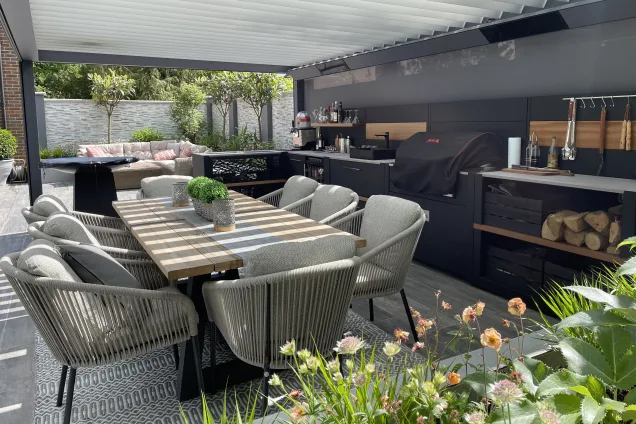 Outdoor kitchen in Copthorne West Sussex with outdoor seating