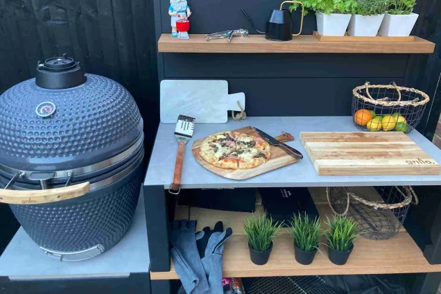 Outdoor kitchen in Winchester, Hampshire with pizza on the worktop