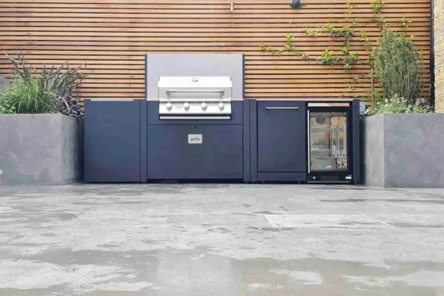 Grillo outdoor kitchen in Queens park London with planters either side