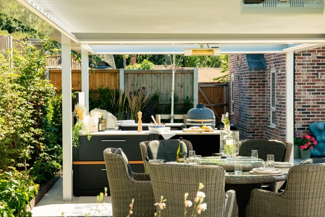 Grillo outdoor kitchen in ardleigh colchester with table set to eat