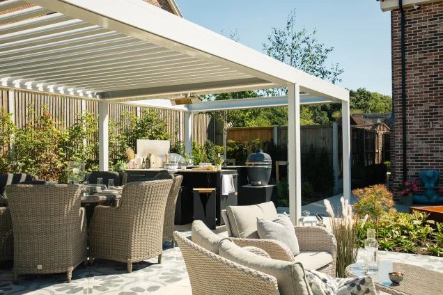 Grillo outdoor kitchen in ardleigh colchester under pergola with food and drink