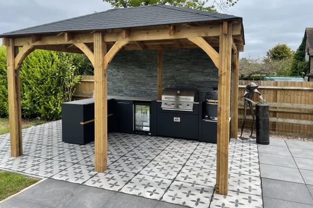Outdoor kitchen in ashford kent on tiles under pergola