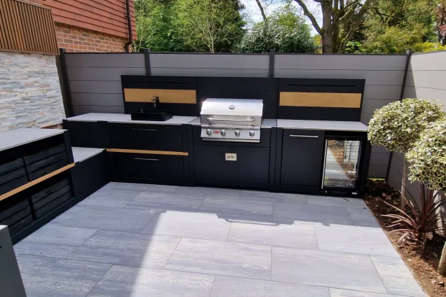 Outdoor kitchen in Besscarr, Doncaster on decking with Gas BBQ and outdoor fridge