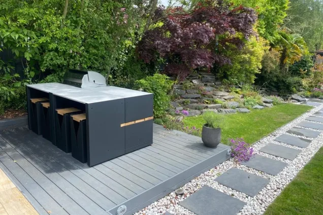 Outdoor kitchen in Bidborough, Tunbridge Wells shaded by trees on decking in established garden