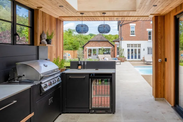 built-in fridge in outdoor kitchen under roof at West Malling