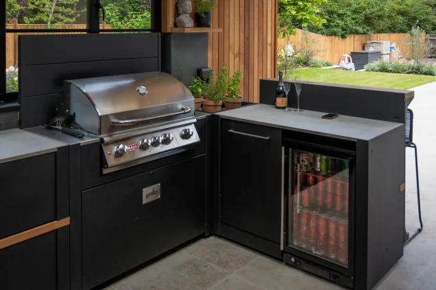 outdoor kitchen with Bull gas bbq and built-in fridge at West Malling, Kent