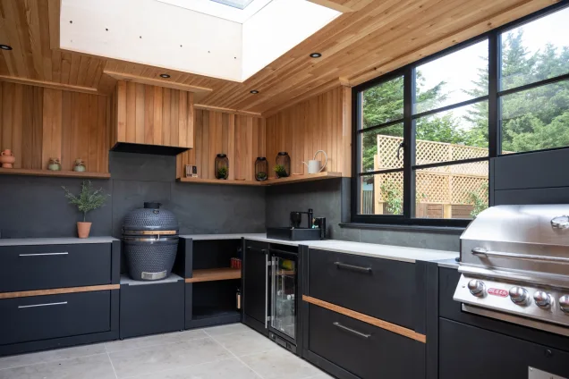 outdoor kitchen under roof with skylights in West Malling, Kent