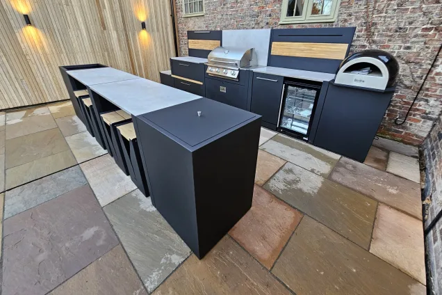 two-row outdoor kitchen with bar seating on patio in Tockwith, York, close-up view