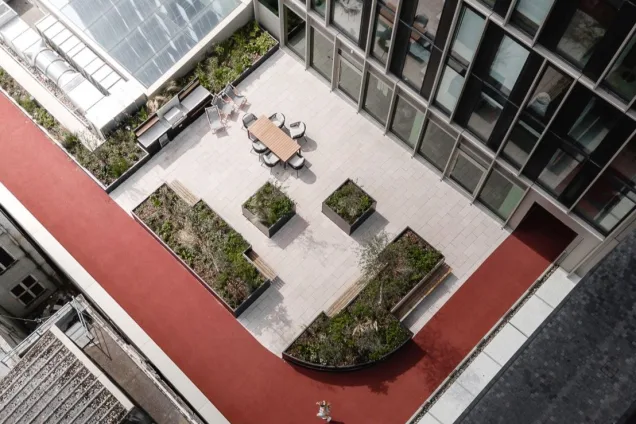 top view of roof-top outdoor kitchen with seating area at The Mercian, Birmingham