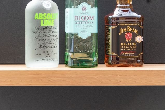 drinks on Iroko Shelf of Grillo outdoor kitchen feature wall