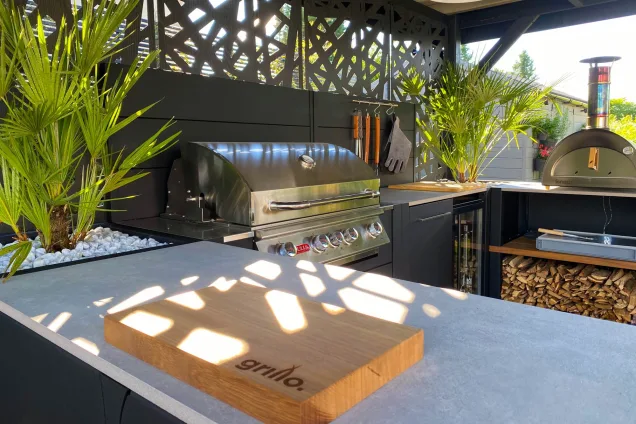 Grillo chopping board and Bull gas grill in outdoor kitchen under roof in Sherston, Malmesbury