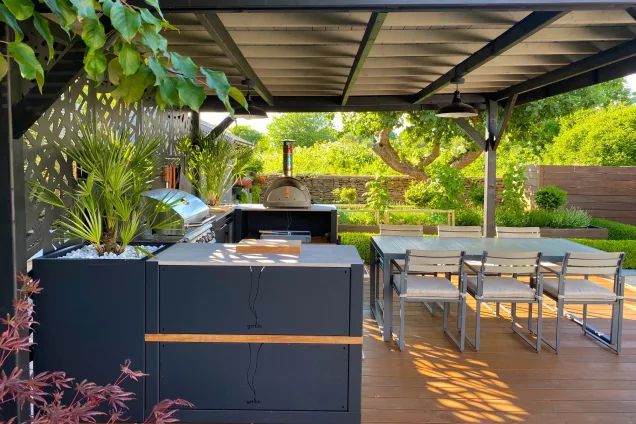 roofed outdoor kitchen with pizza oven and Bull gas BBQ in Sherston, Malmesbury