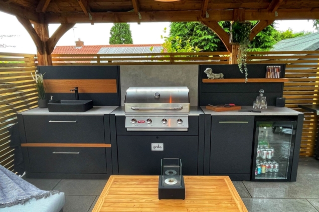 sink, Bull gas grill and built-in fridge in outdoor kitchen under roof in Sheffield, South Yorkshire