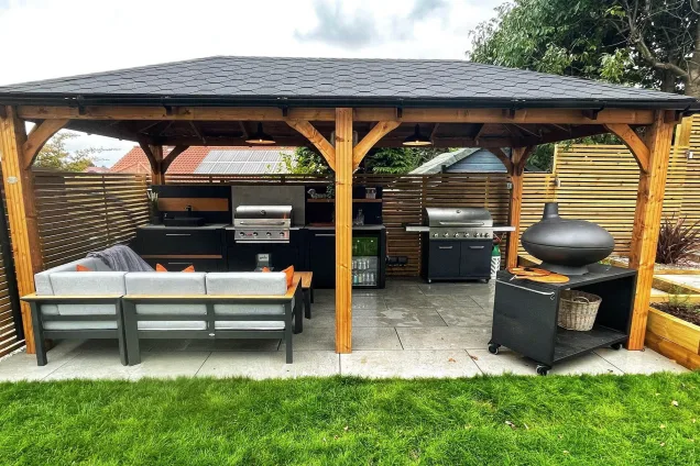 sink, Bull gas grill and built-in fridge in roofed outdoor kitchen in Sheffield, South Yorkshire