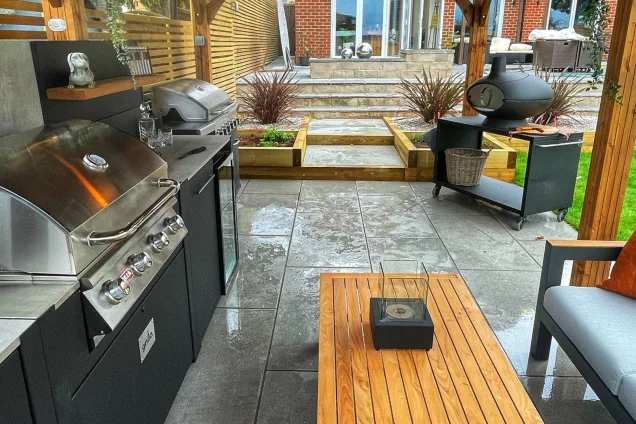 two gas grills in outdoor kitchen under roof in Sheffield, South Yorkshire