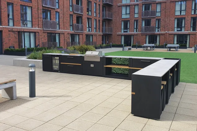 communal outdoor kitchen with bar seating in Salford, Manchester
