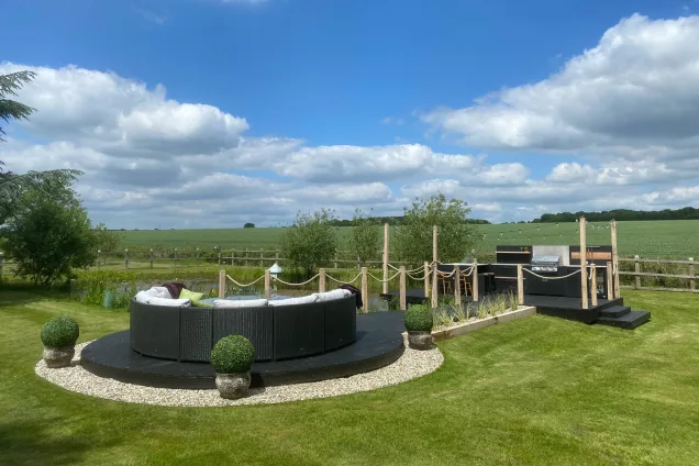 outdoor kitchen on pontoon with seating area in Saffron Walden, Essex