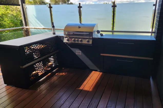 outdoor kitchen with bar and gas grill on terrace in Research, Melbourne