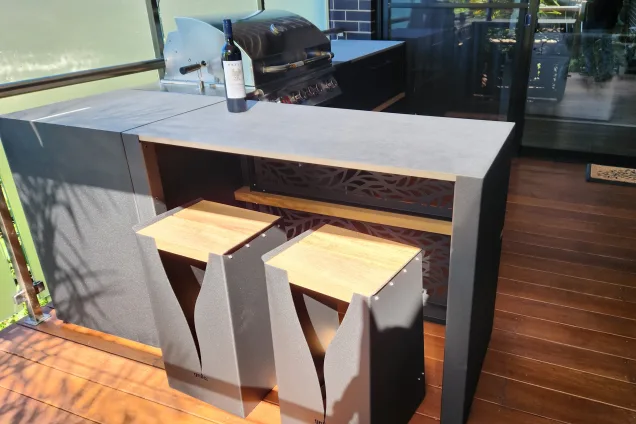 bar seating on terraced outdoor kitchen in Research, Melbourne
