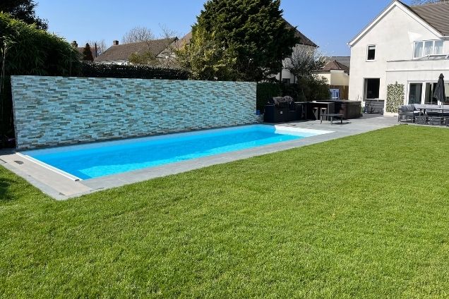 outdoor kitchen next to pool in Warlingham, Surrey