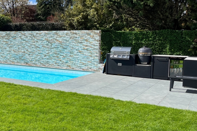 L-shaped outdoor kitchen next to pool in Warlingham, Surrey