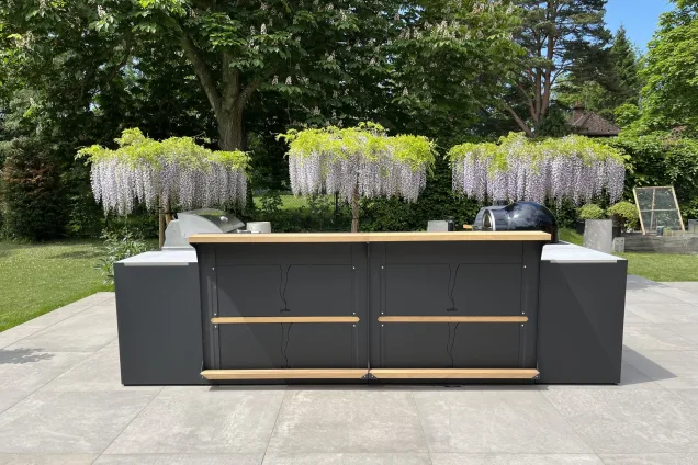 outdoor kitchen bars front view on patio with wisteria trees in background in Reading, Berkshire