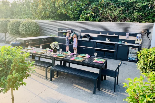 Outdoor kitchen in Bosham, Chichester on patio with large outdoor eating area