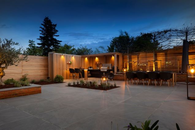 outdoor kitchen in Oxshott, Surrey with night lights