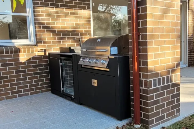 Outdoor kitchen in croydon sydney with tarn sink