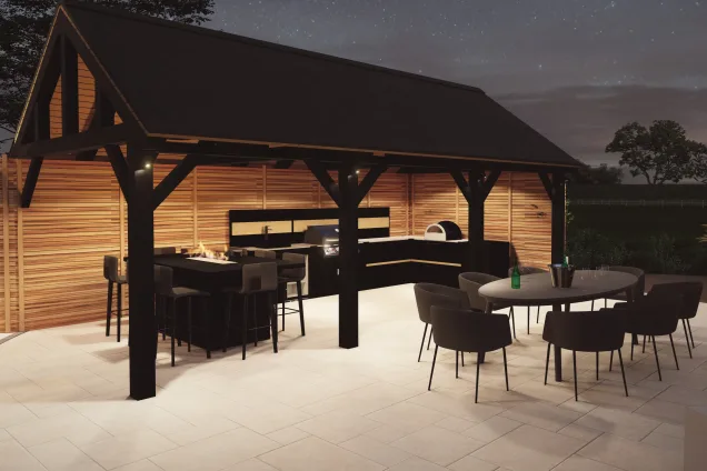 outdoor kitchen on patio under pitched roof garden building with nightlights in Nuneaton, Warwickshire