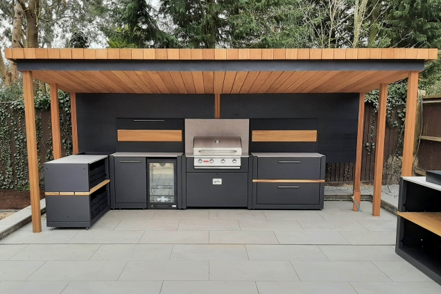 L-shaped outdoor kitchen under roof in Longstanton, Cambridge