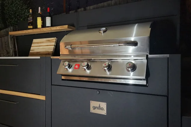 Outdoor kitchen in Geelong with bull gas bbq in evening