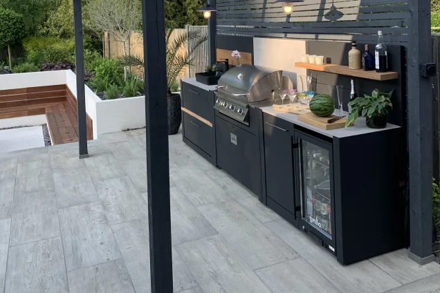Outdoor kitchen in sussex with bull bbq and storage units