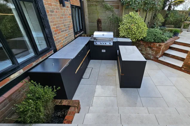 Outdoor kitchen in Berkshire with gas bbq and storage cabinets