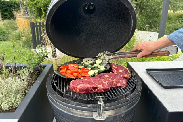 outdoor kitchen BBQ with steaks