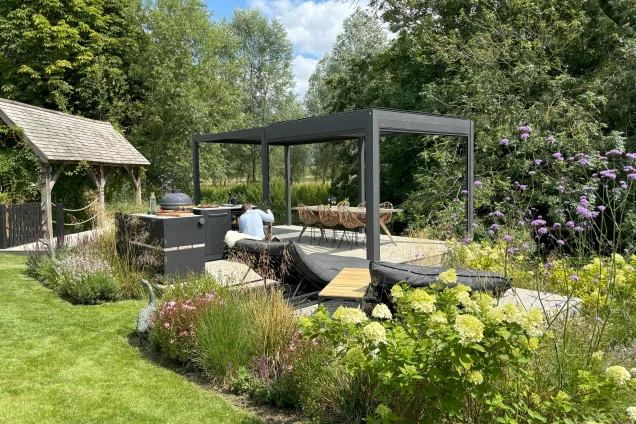 outdoor kitchen area with pergola in Essex