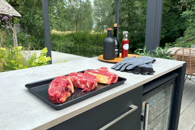 outdoor kitchen in Kelvedon with steak on worktop