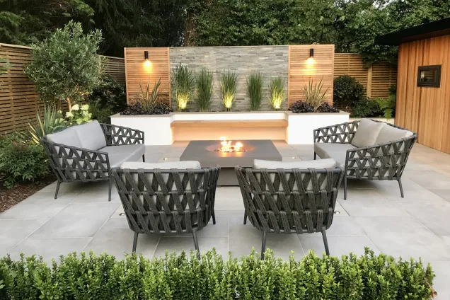 Outdoor kitchen in Keston Kent in large garden with seating area with firepit