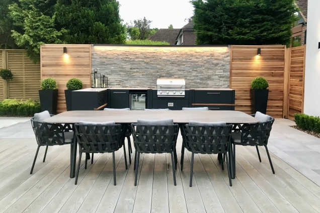 Outdoor kitchen in Keston Kent in large garden with storage units and bull gas bbq