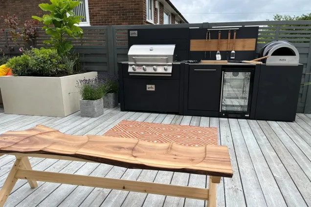 Outdoor kitchen on ITV series with bull gas bbq and fridge and bin