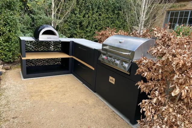 Outdoor kitchen in Surrey with Pizza oven and Gas BBQ