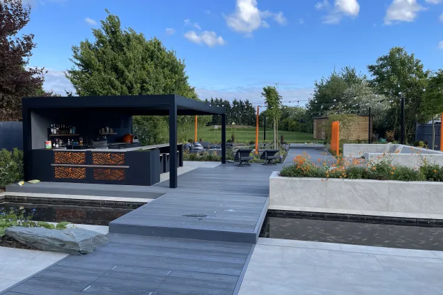 Outdoor kitchen in Bedfordshire on decking in large garden