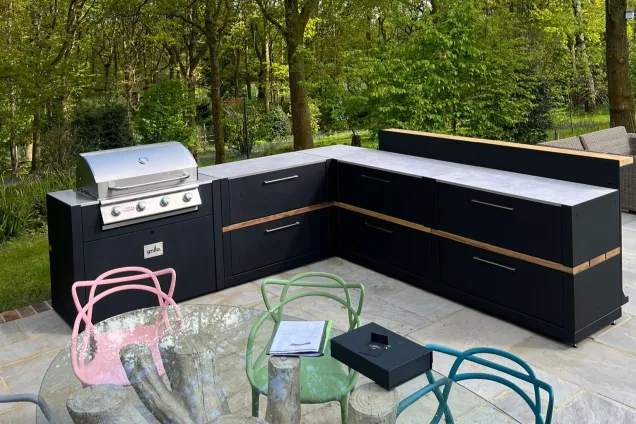 Outdoor kitchen in Cranleigh with bull bbq and bar cabinets