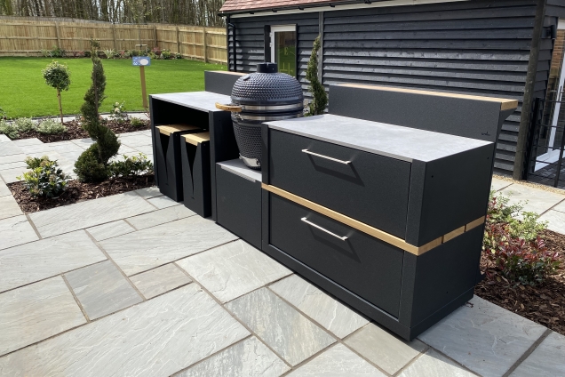 Outdoor kitchen in surrey with Gusto bbq, storage and bar stools