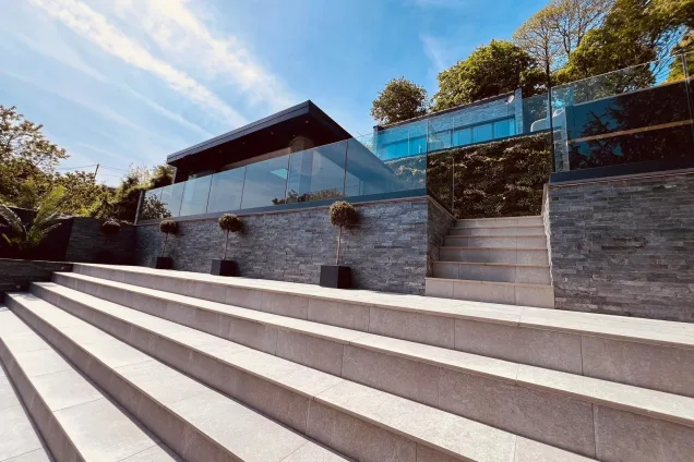 Outdoor kitchen in Wrexham in large sloped garden at top of steps