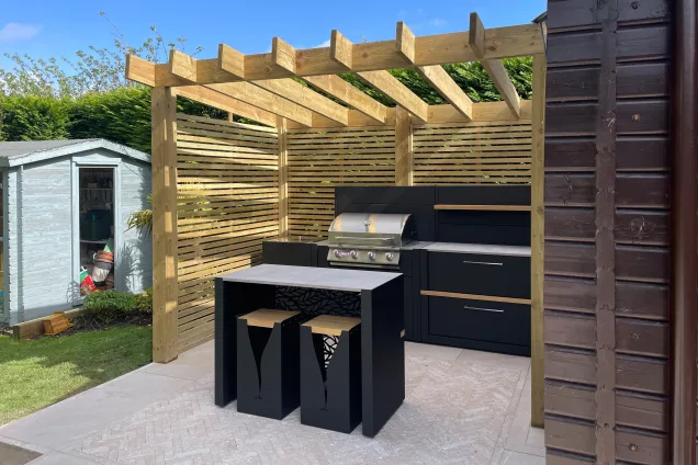outdoor kitchen with Bull Gas Grill under pergola in Edlesborough, Dunstable