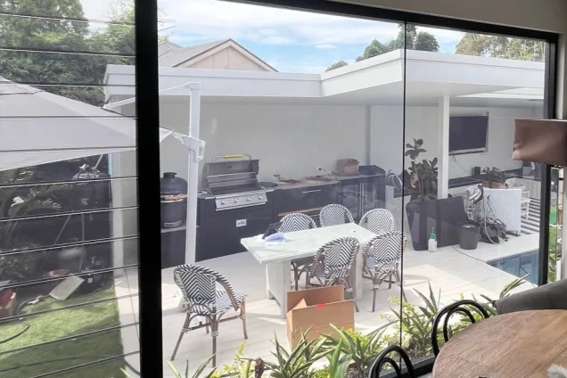 Outdoor kitchen in Sydney through window