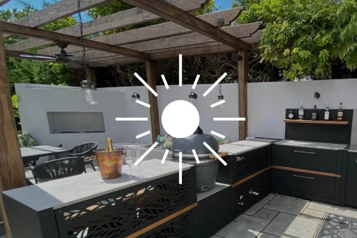 outdoor kitchen with sun graphic over it
