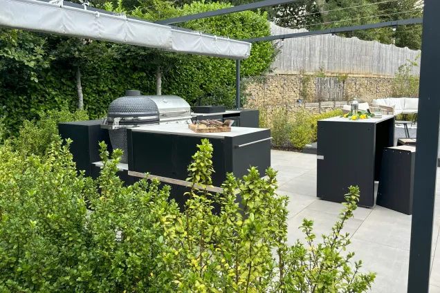 outdoor kitchen on patio in garden