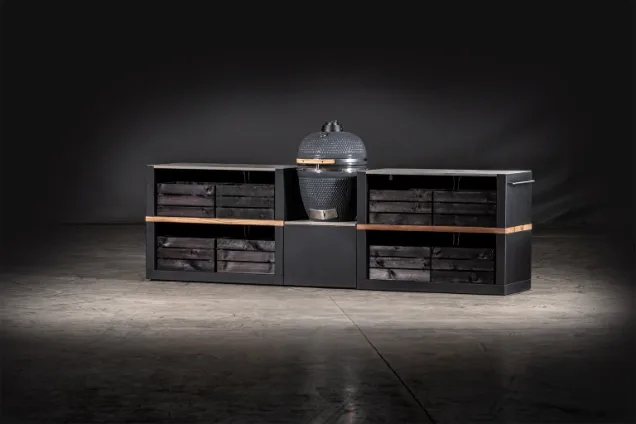 Outdoor kitchen with egg BBQ and storage crates for outdoor cooking
